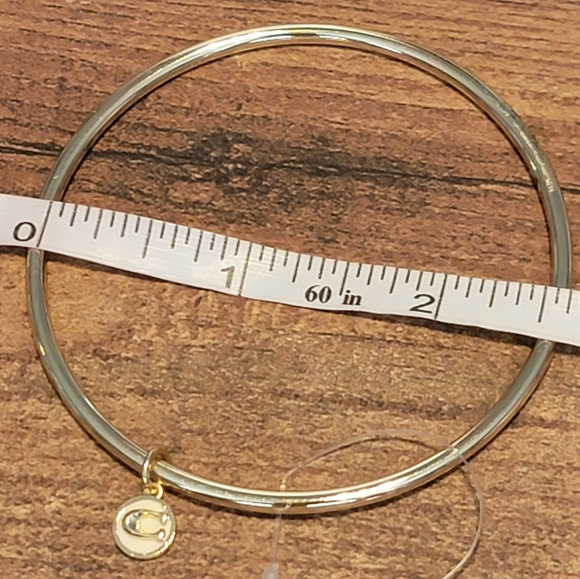 Coach Goldtone Bangle White/Gold C Charm NWOT includes box and coach wrapping - Picture 6 of 6